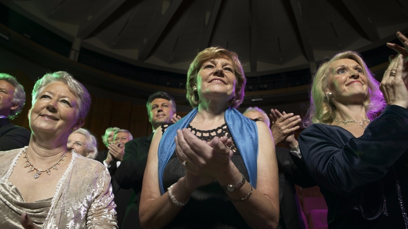 20160115154511 women applauding theater standing ovation seniors watching celebrating audience cheering